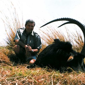 Ralf Schneider with his 48 1/4-inch sable-Mahango Game Park, Namibia
