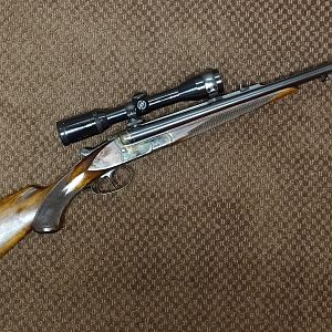.450/400 2 3/8" NE aka 10,3x60R made from a Simson Suhl 16 gauge SxS shotgun