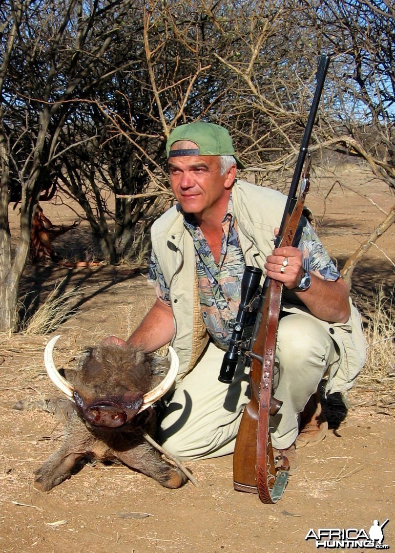 Holstein Hunting Safaris Namibia - Client with a nice Warthog