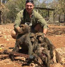 Idaho game commish and baboons.jpeg