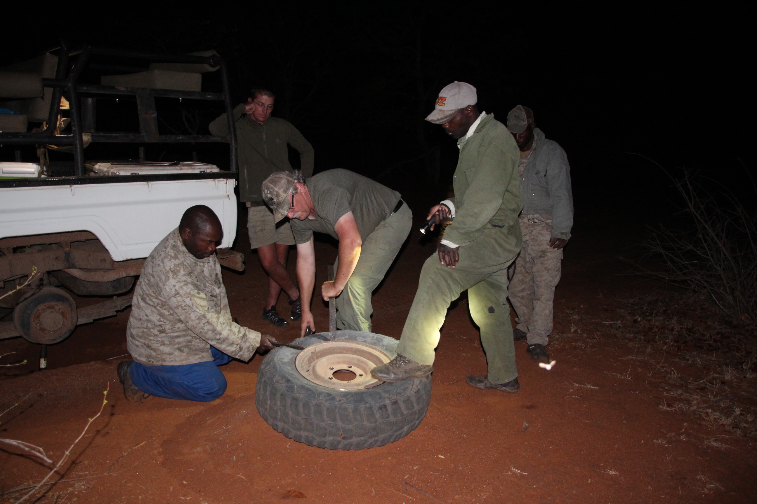 Zimbabwe fixing tire.JPG