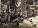 Spears, daggers and muskets after a Leopard hunt near Mount Bromo in East Java, 1912.jpg