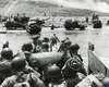 troops-Omaha-Beach-American-beach-presence-vehicles-June-6-1944.jpg