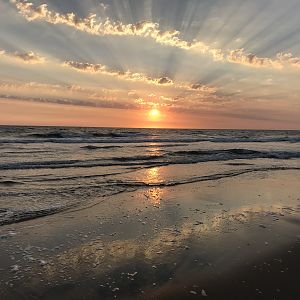 Sunset after a day of sand shark fishing in Namibia