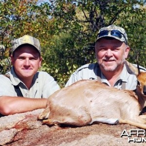 Hunting with PH Devlin Carton-Barber (left)