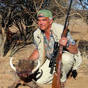 Holstein Hunting Safaris Namibia - Client with a nice Warthog