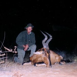 Holstein Hunting Safaris Namibia - client with Red Hartebeest