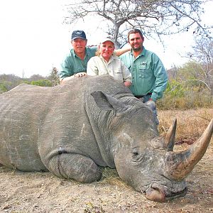 Lady hunter with her awesome thick horned old bull, 14 day safari, wild rhino!