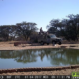 Hunting Vehicle at Waterhole Trail Cam Pictures South Africa