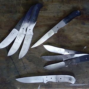 Three Skinners, three classic mini Skinners, a Boner and a Safari Knife