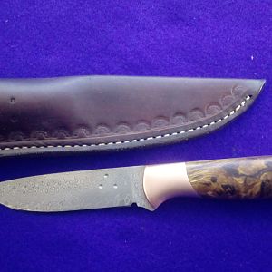 Knife with Raindrop stainless damascus blade and Stabilised Spalted Eucalyptus