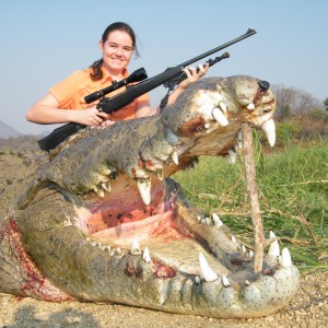 BIG crocodile with proud girl !