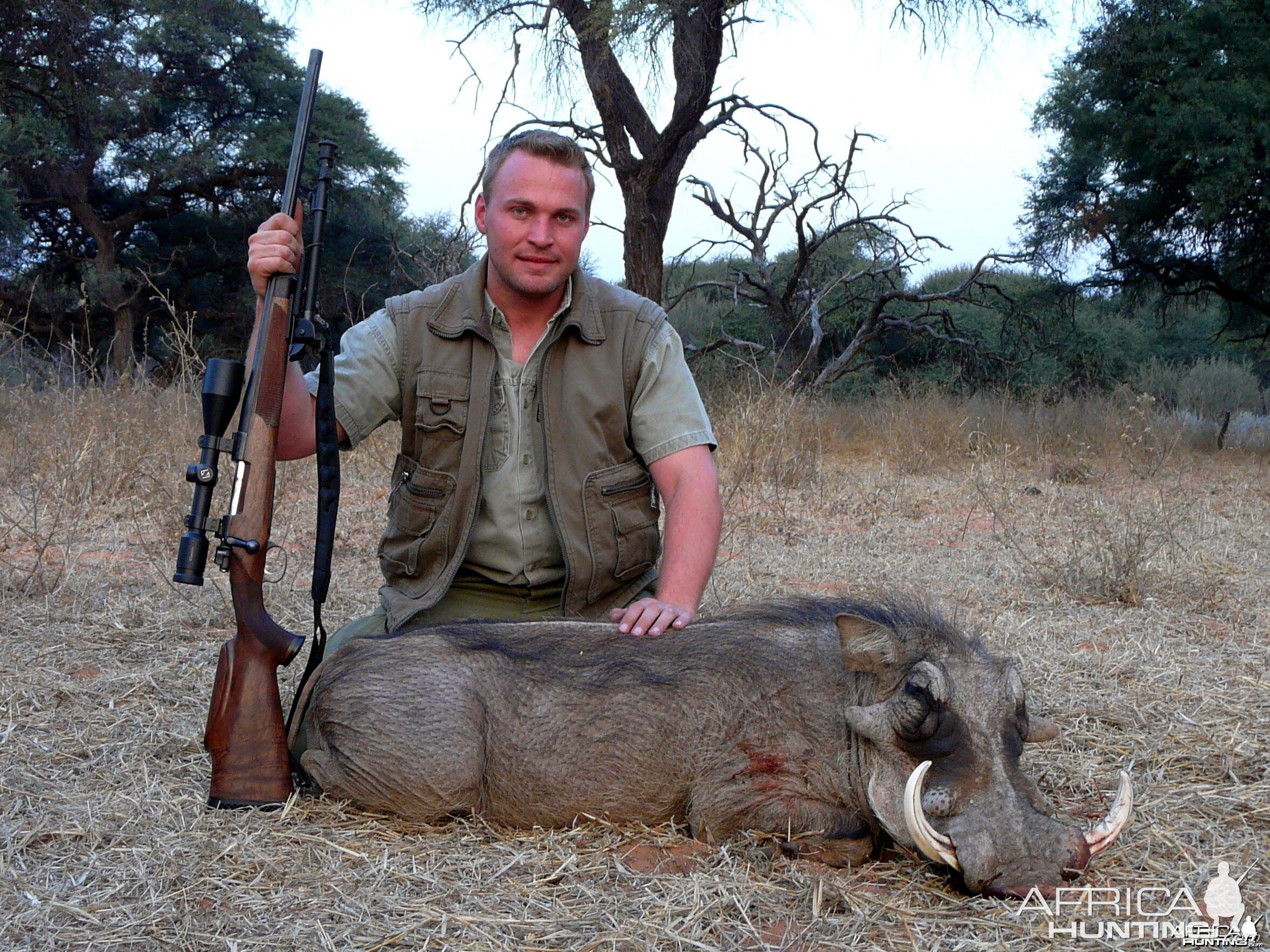 12"Warthog taken near Grootfontein, Namibia, by Charl Kemp