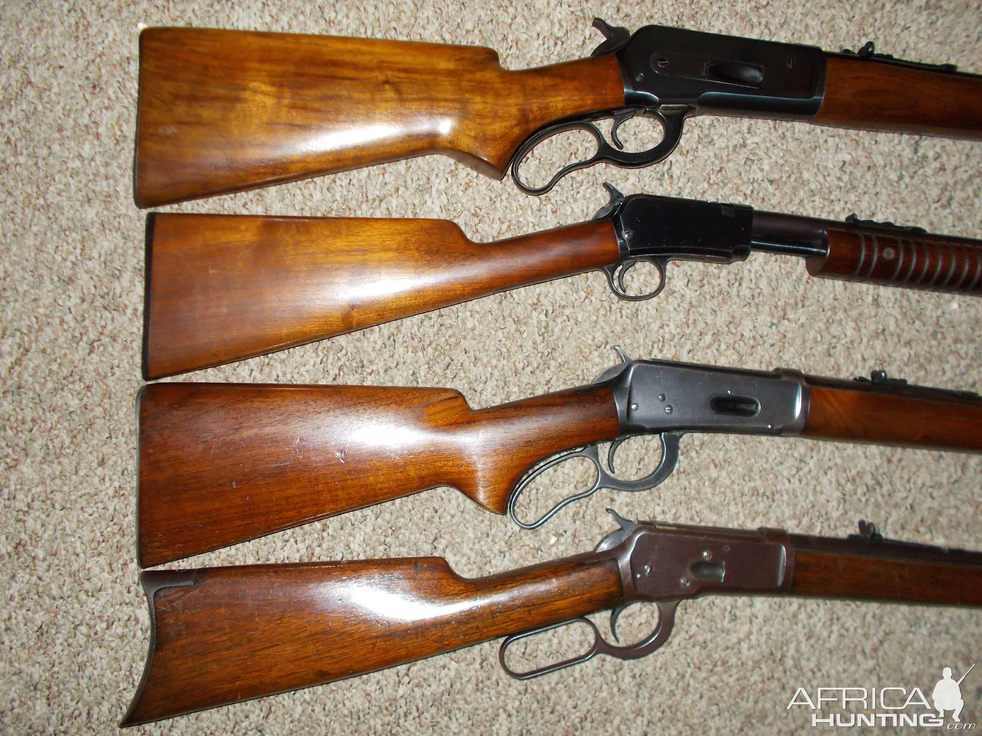 Four older Winchester rifles