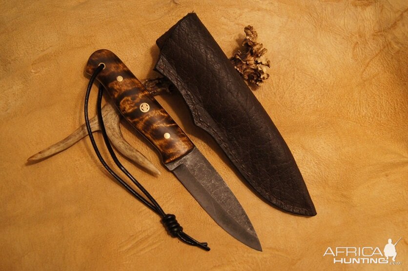 Knife & Sheath made out of Cape Buffalo Leather