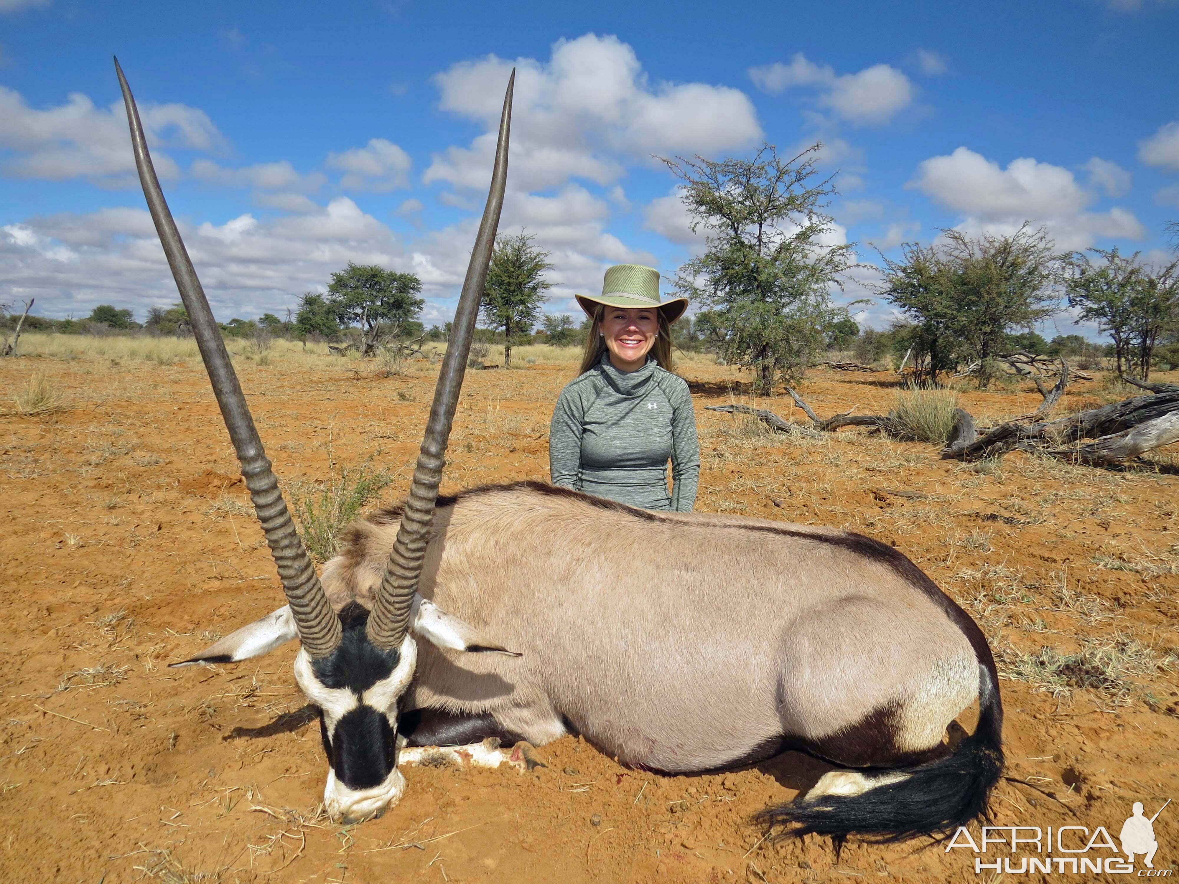 lady hunter and gemsbok