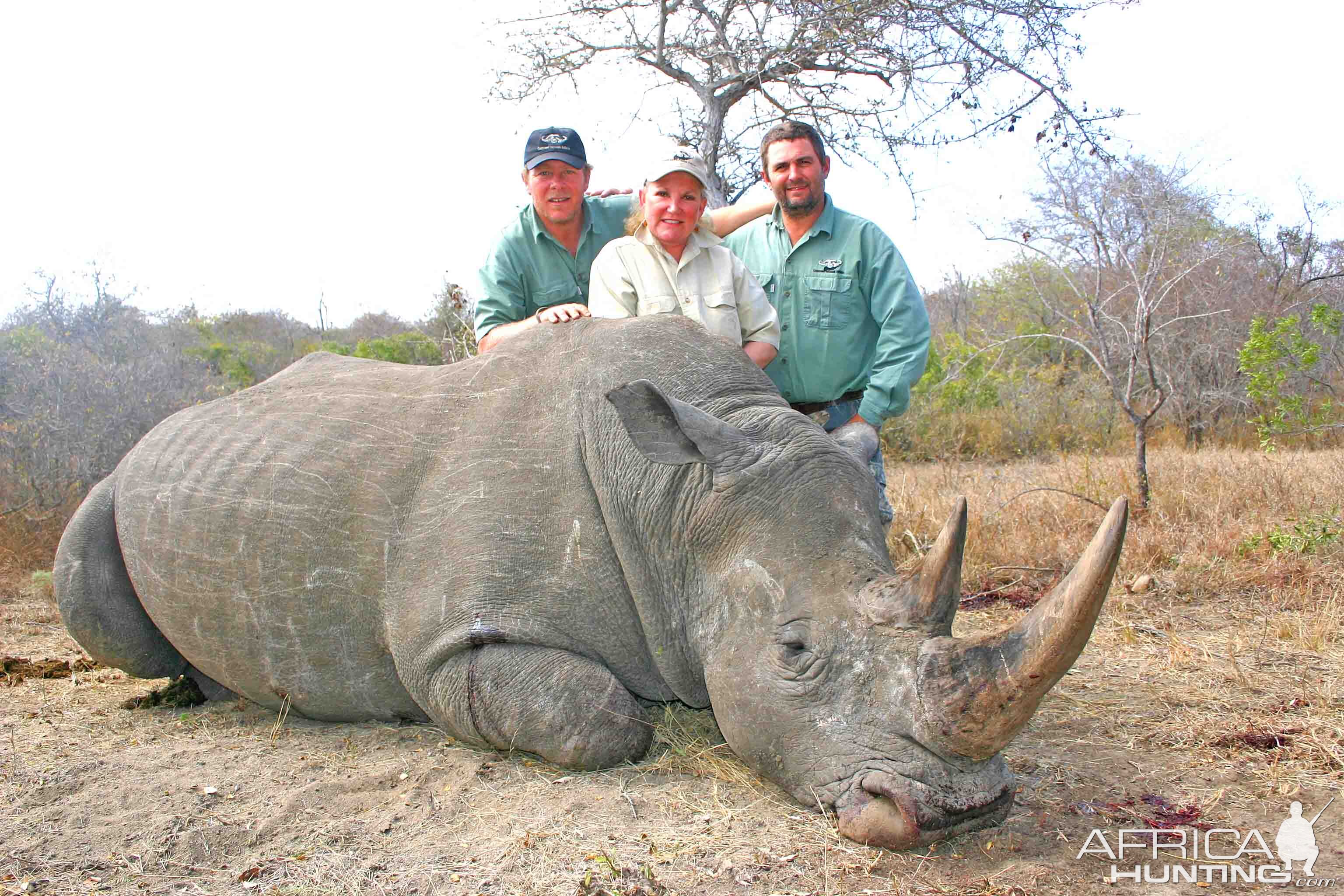 Lady hunter with her awesome thick horned old bull, 14 day safari, wild rhino!