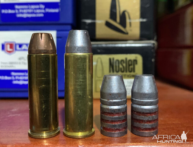 Loaded cartridge with the bullet next to it and a factory Hornady XTP 240gr for comparison