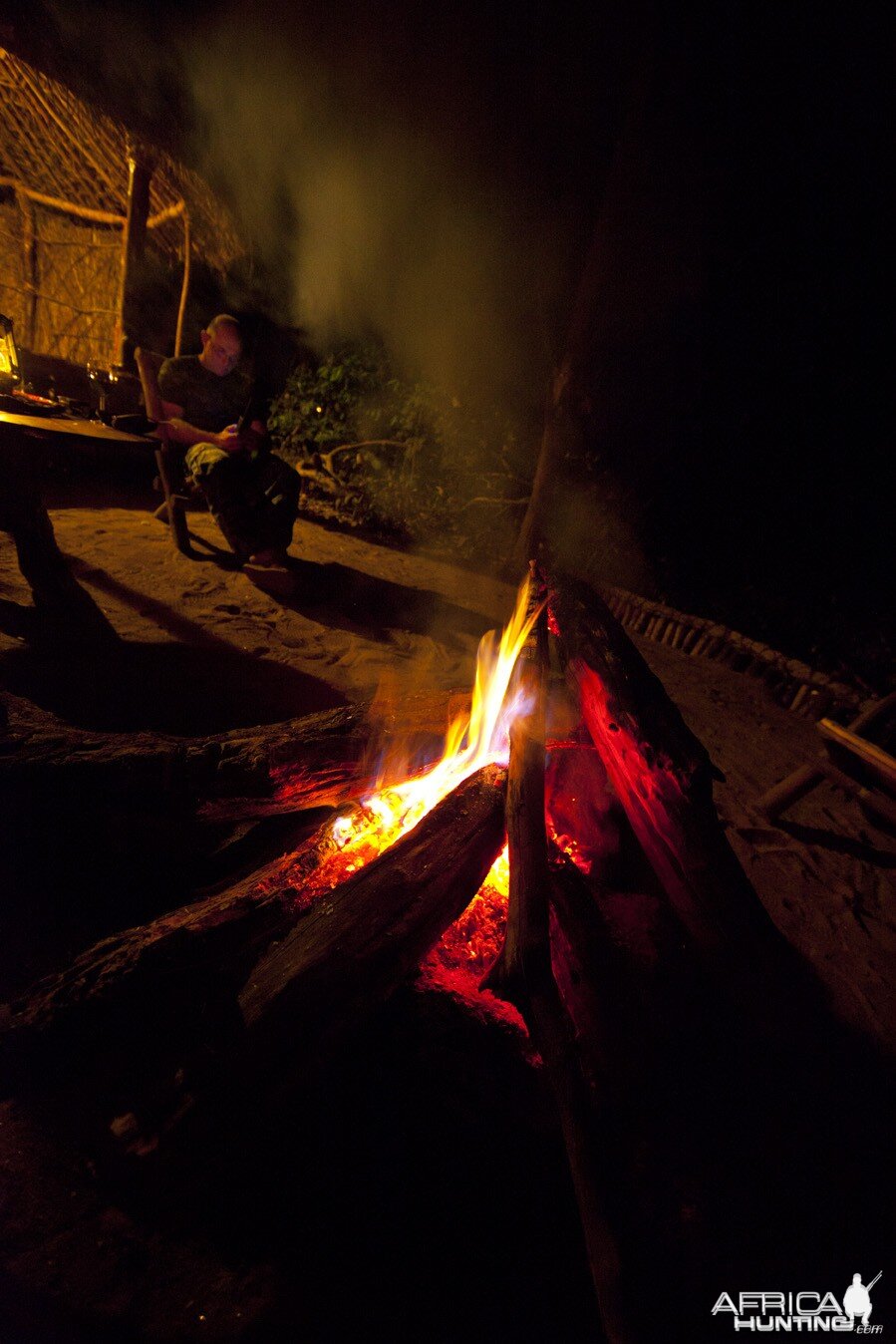 Man by campfire...