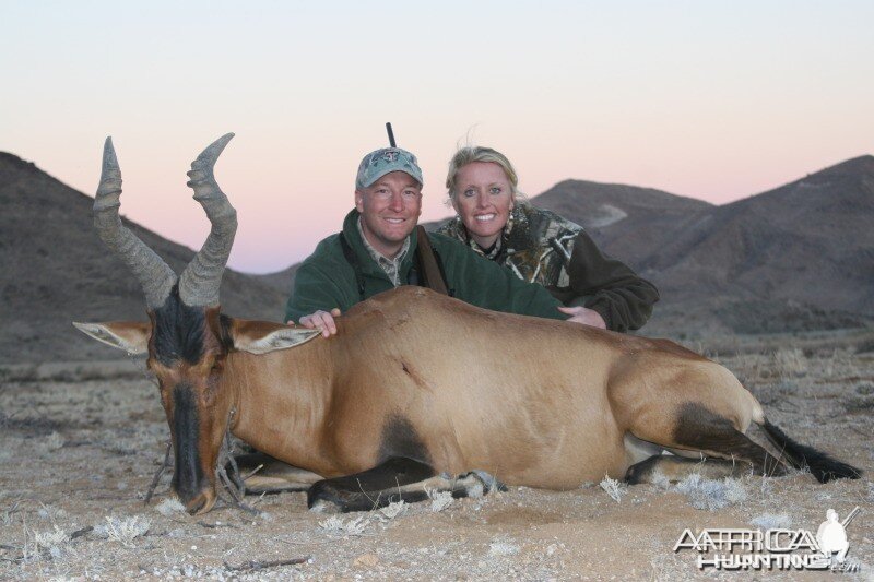 My wife and I with a Red Hartebeest taken in Southern Namibia with Kum Kum