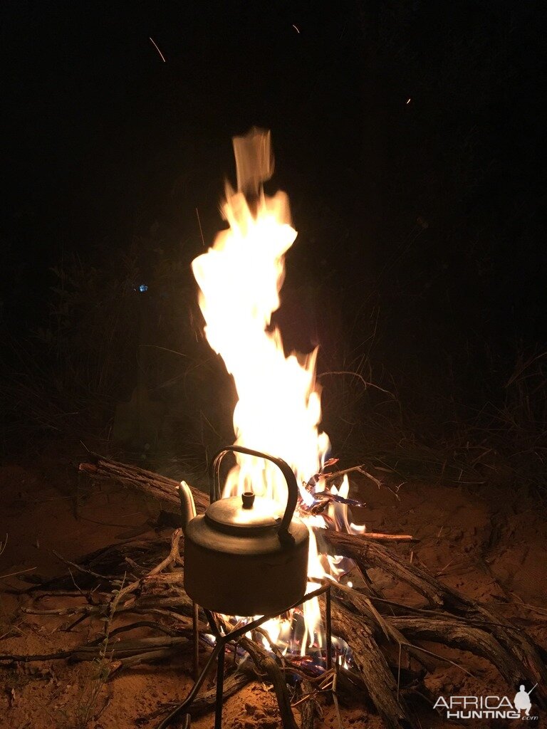 Preparing drinks on the fire