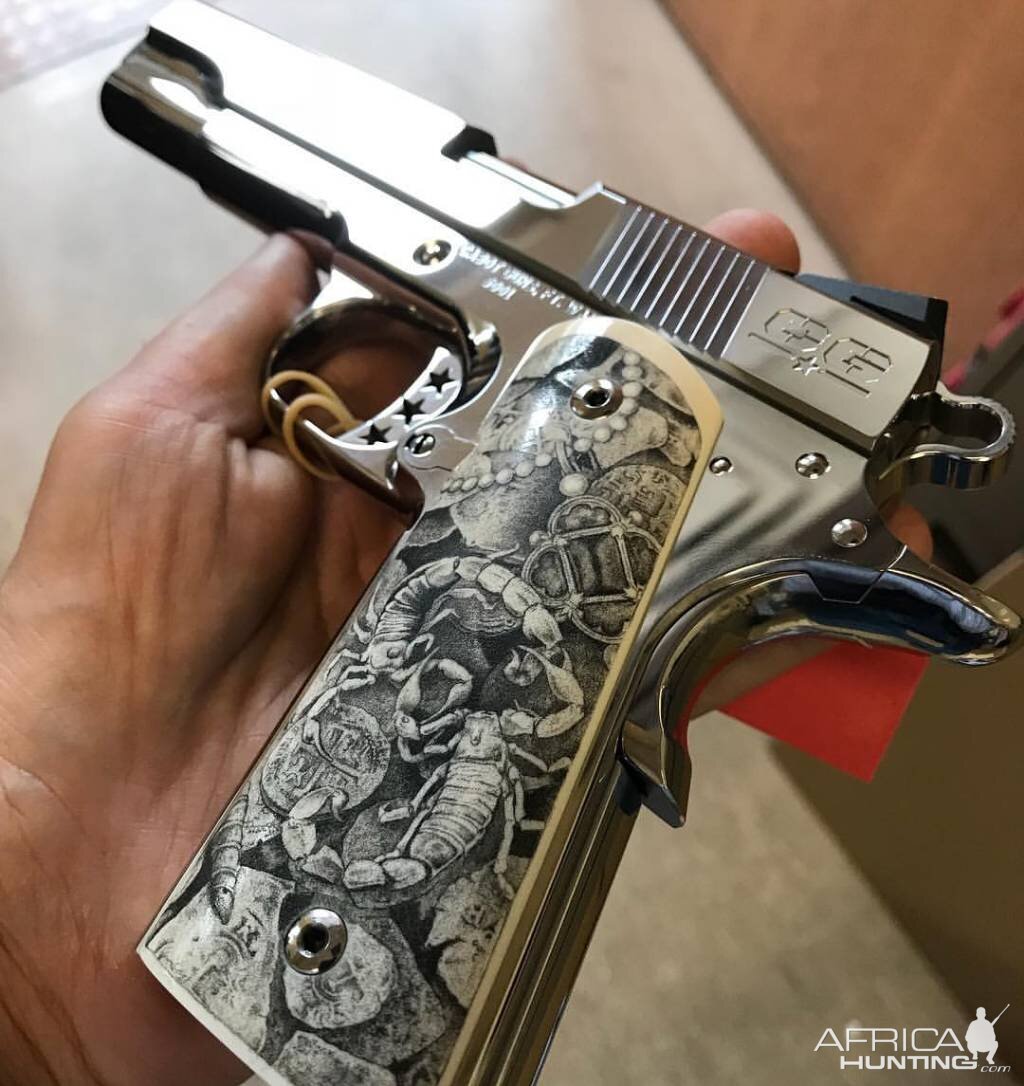 Scrimshaw Art on grips of Cabot Guns