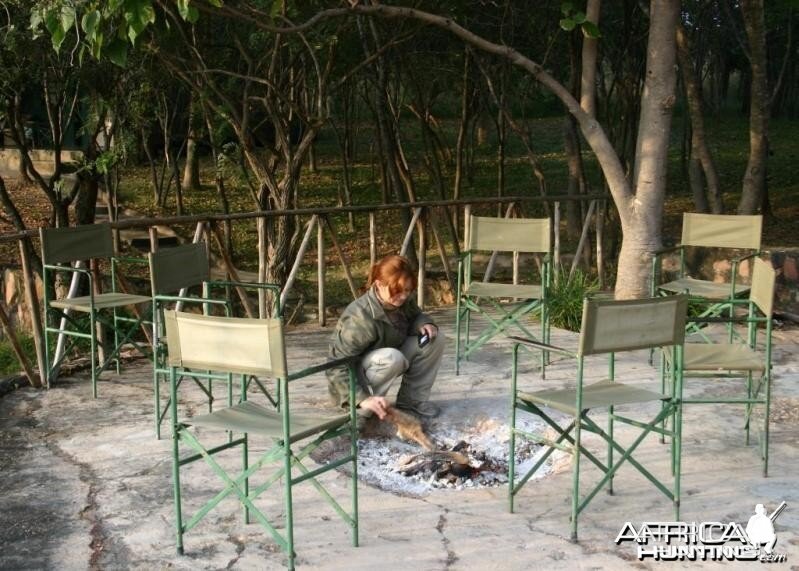 Stoking the Fire at Camp in Zimbabwe