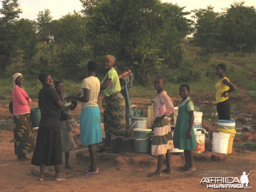 village women getting water